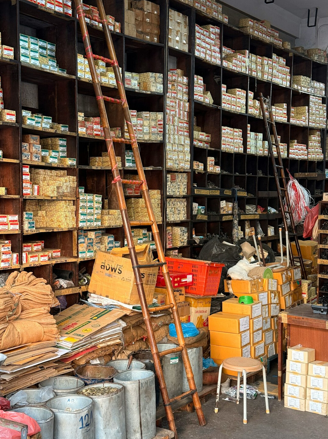 Organized warehouse shelving with labeled inventory boxes